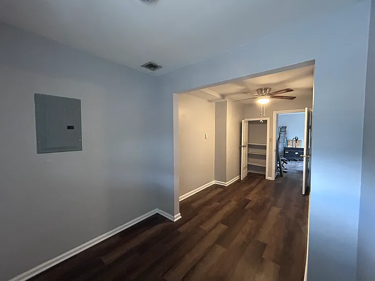 Bedroom #2 with new flooring and paint