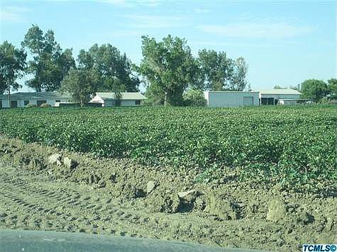 a view of house, Garage, Shop, and Barn