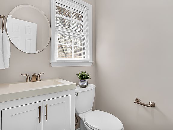 Private half bath. Shared shower is in bathroom downstairs.