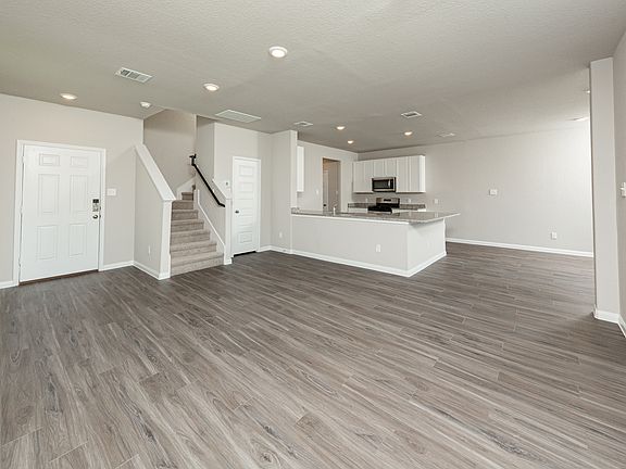 Family Room to Kitchen and Dining Area