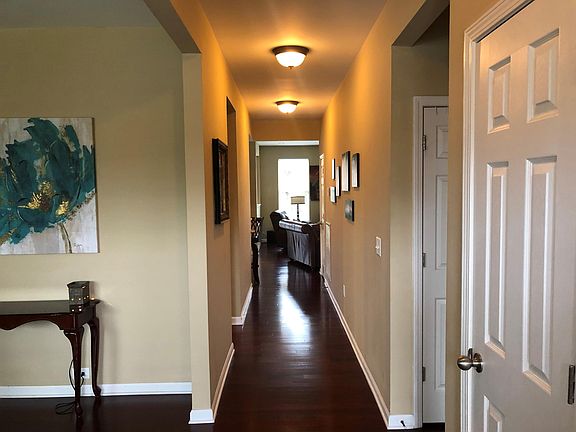 Foyer, formal dining to the left and two bedrooms and the full bath to the right. Foyer will take you to the kitchen in left and living room to your right.