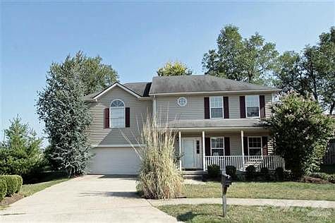 Covered porch to enjoy the warm fall days on this quiet cul-de-sac.