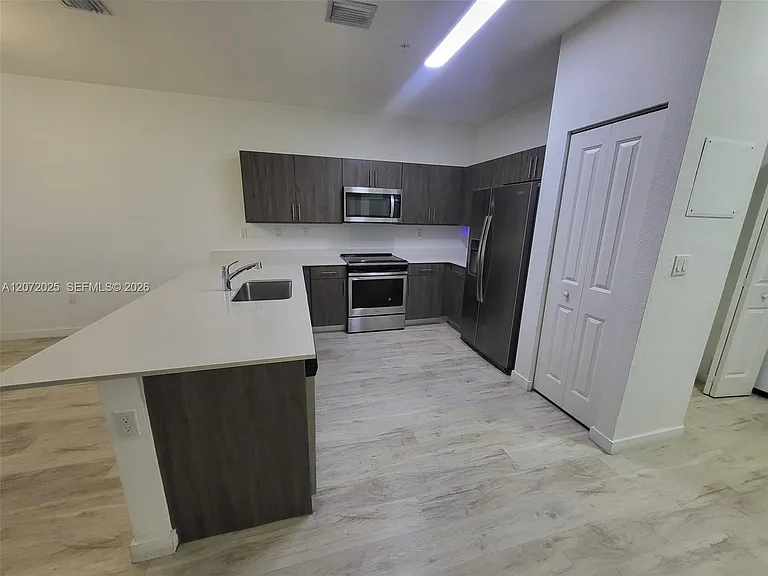 15560 SW 136th St #213 — Photo 8