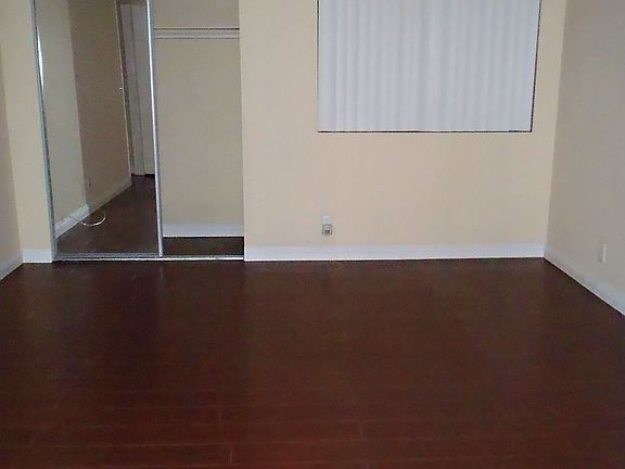 Bedroom with wood floor