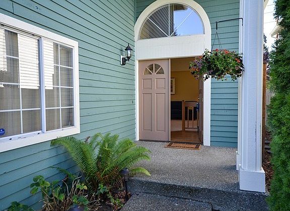 From the fresh paint on the true wood siding, to the double doored entry.... you KNOW you are home. Your guests will know it too !   Character and Charm.