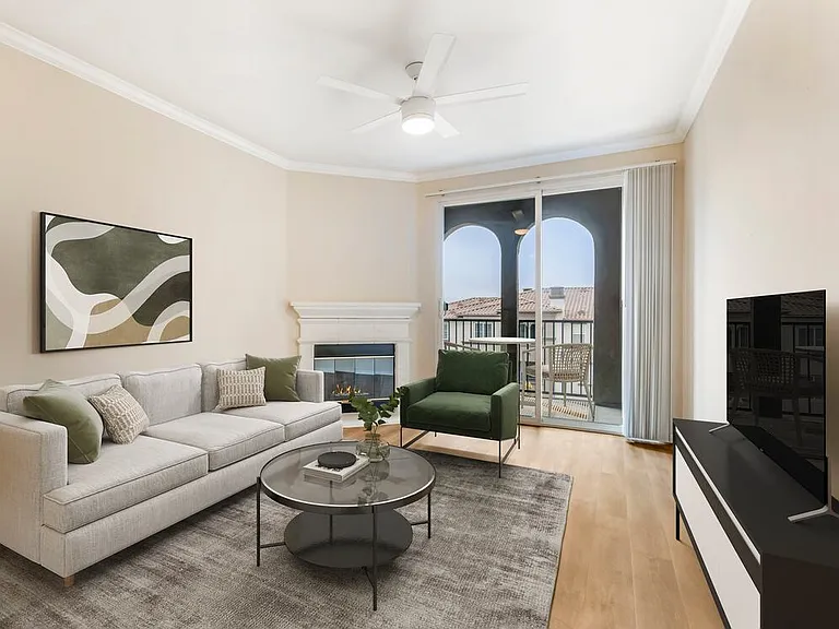 Renovated Package I living room with upgraded hard surface flooring