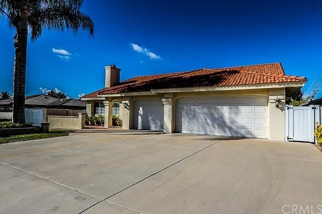 Hard to find single store home with 3 car garage, flat driveway and RV parking