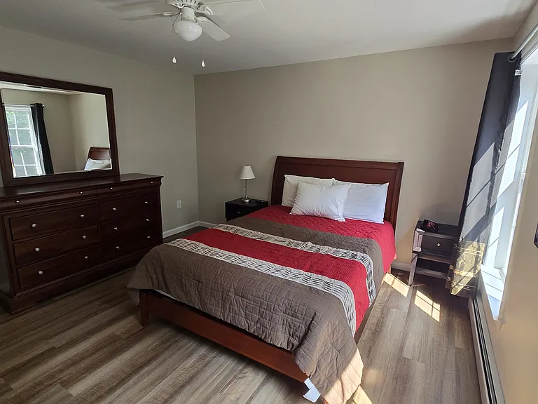 Queen bed in 2nd floor bedroom with adjustable base.