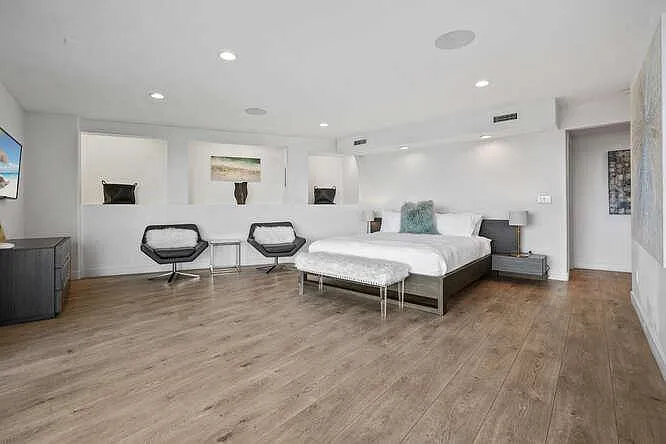 Rest and rejuvenate in our exquisite King-sized master bedroom, a sanctuary of relaxation.
