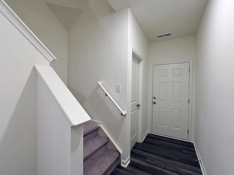 Entry way. Carpet replaced with LVP
