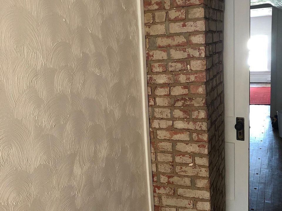 Exposed brick chimney