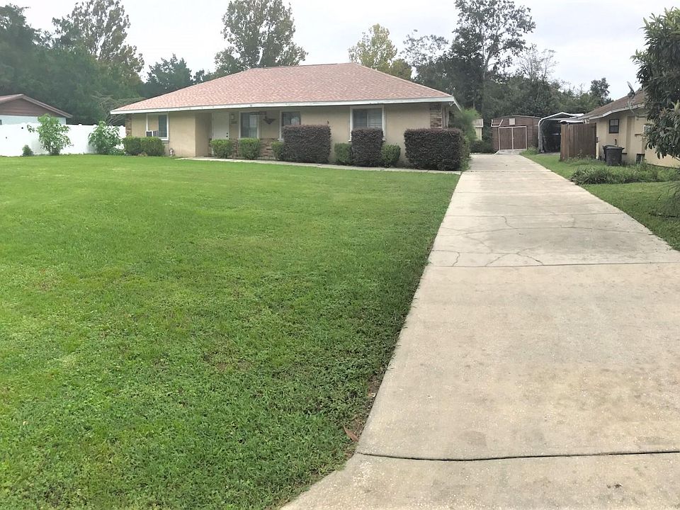 Entrance to covered secure parking in back of property