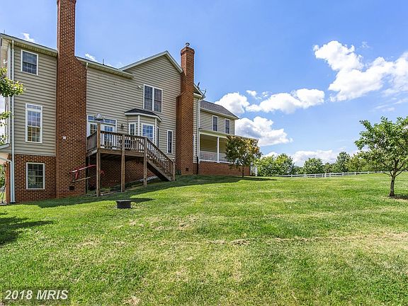 This home has both a deck and a huge porch!