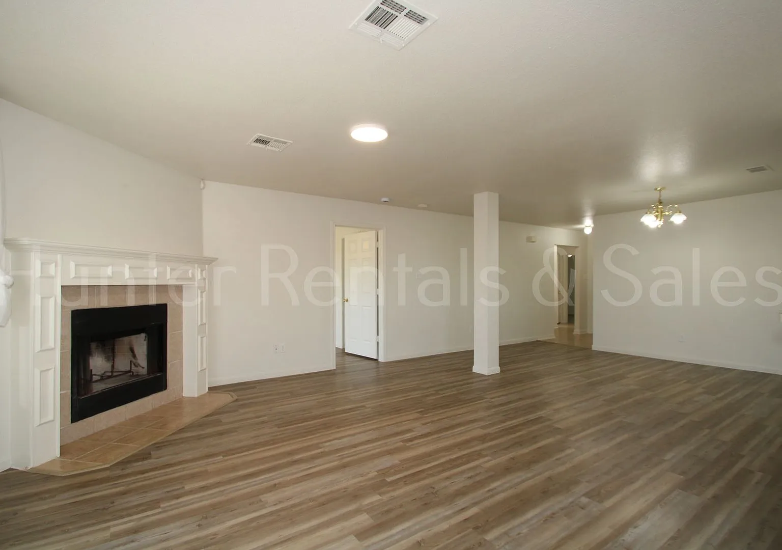 Charming 3-Bedroom Home with Fireplace, Spacious Primary Suite & Covered Deck — Photo 3