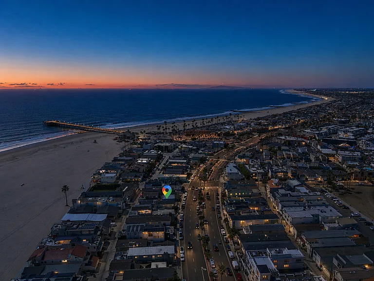 Evening aerial of the coastline and neighborhood