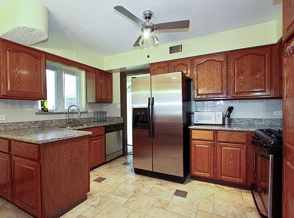 5th image of 9820 S 50th Ct