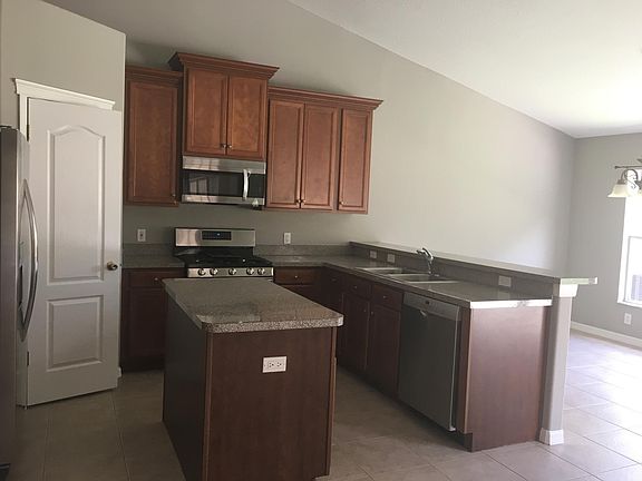 Eat in kitchen with bar seating.