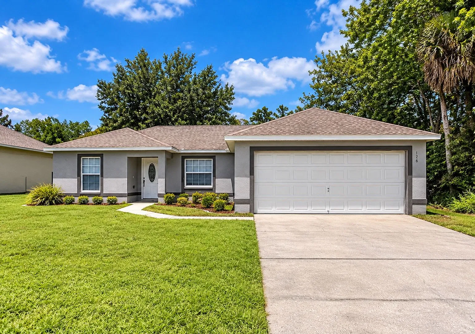 Best Value in Poinciana! Charming 3-Bedroom Home Near Everyday Conveniences! — Photo 1