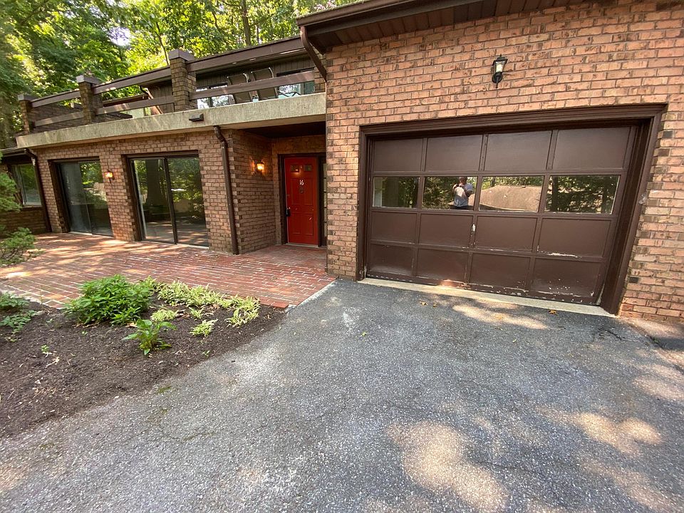 Front door, garage, and patio