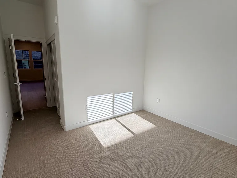 Main floor bedroom with shared bathroom