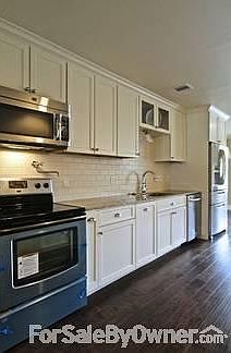 Gourmet Kitchen Galley Wall
						:
						Granite counters, new stainless steel appliances.