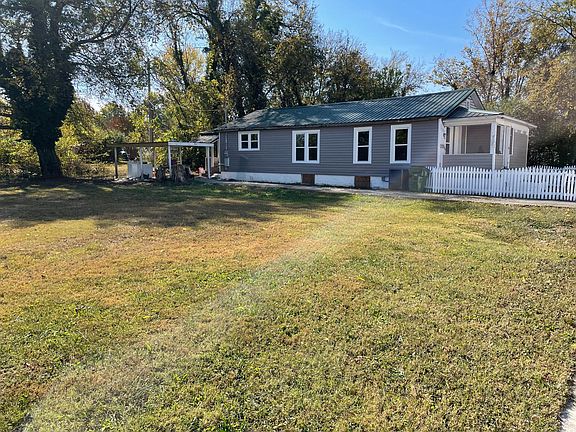 Side and Empty Lot Next Door