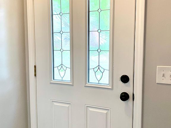 Featuring custom steel entry door.