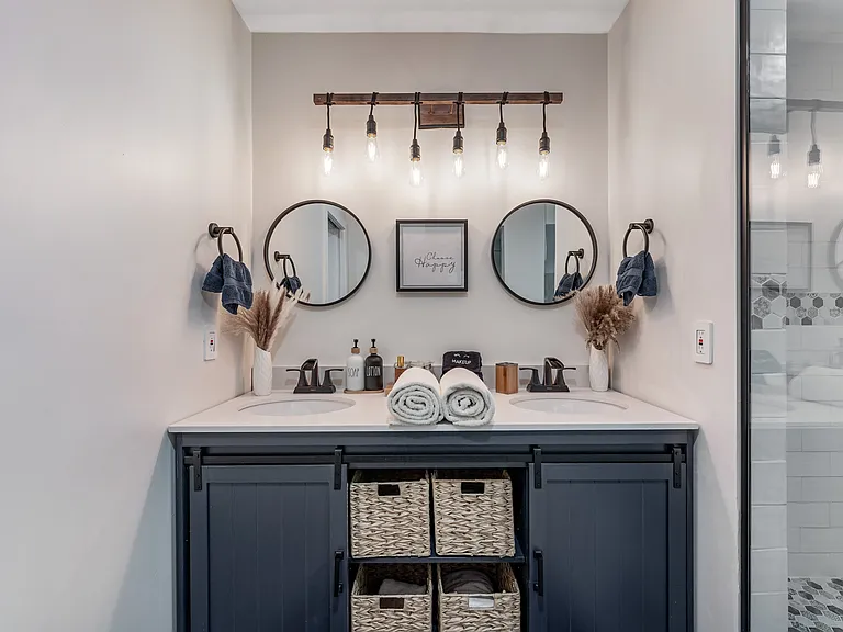 Ensuite to Bedroom #3. Dual sink vanity, walk-in shower, separate toilet