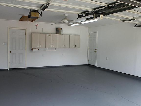 This garage is immaculate with its new paint on the walls and floor