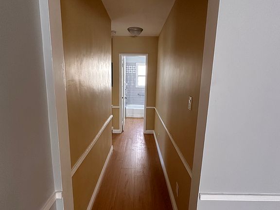 Hallway leading to bathroom & bedroom