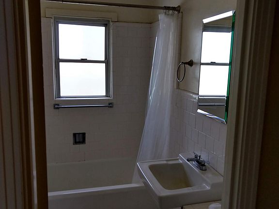 Bathroom with new (not show) vanity and energy-efficient toi