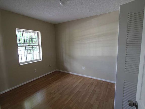 Bedroom with Wood Laminate Flooring