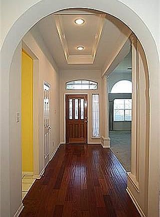 Entry with wood floors 