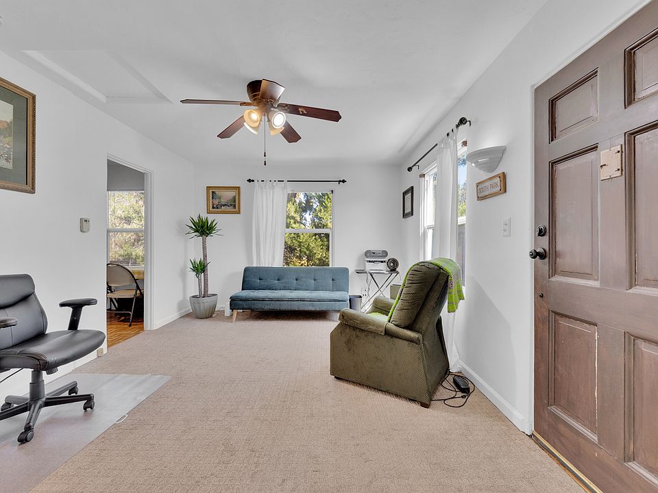 350 sq ft of quiet, private studio above two-car garage includes portable clothes closet, ceiling fan with light, view of TJ at night and South Park canyon