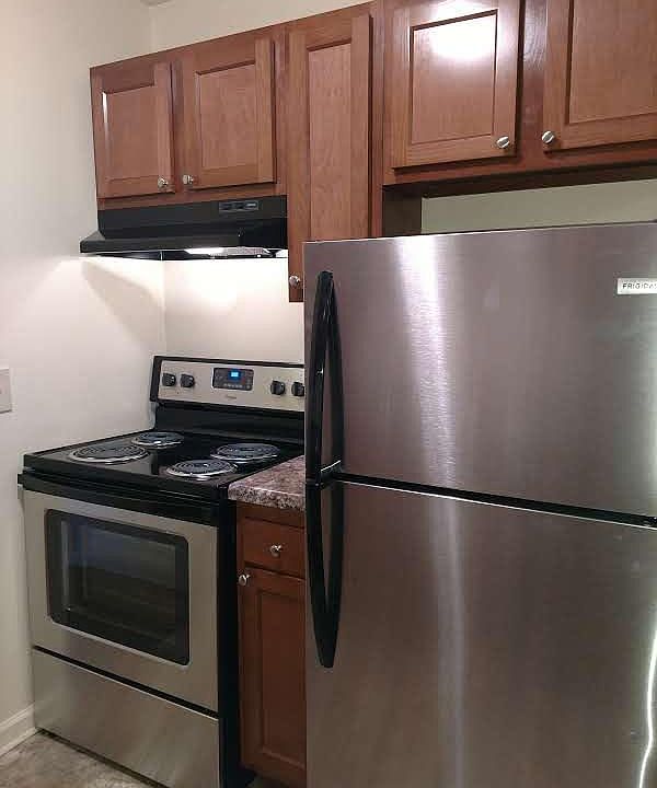 NEW STAINLESS STEEL APPLIANCES, CABINETS, AND COUNTERS