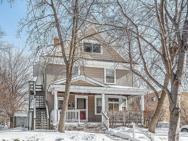 Beautiful Turn of the Century Triplex with Classic Front Porch.