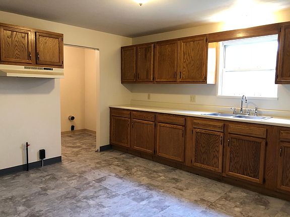 Kitchen with view of the laundry room.