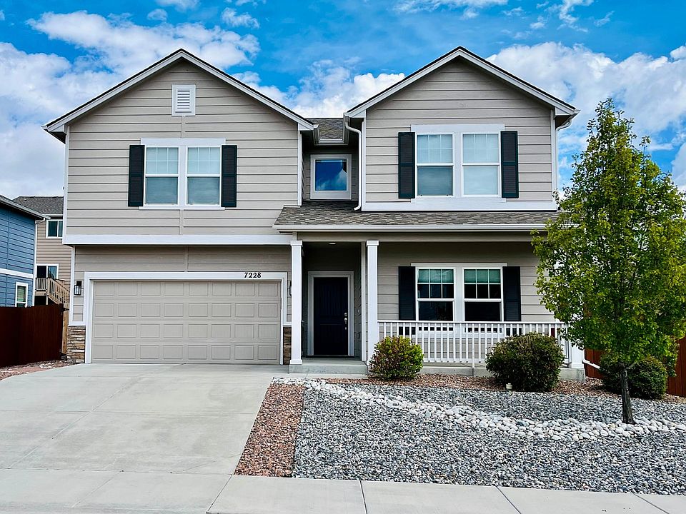 Enjoy the sunset and mountain views from the covered front porch