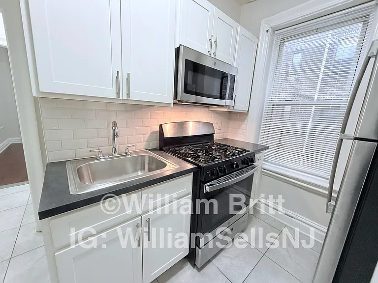 125-127 Corbin Ave #303 — Photo 1