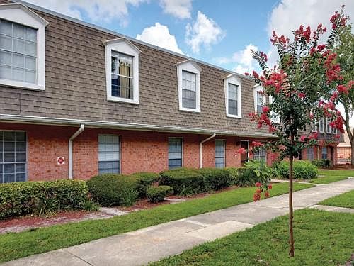 Gated community with manicured landscaping