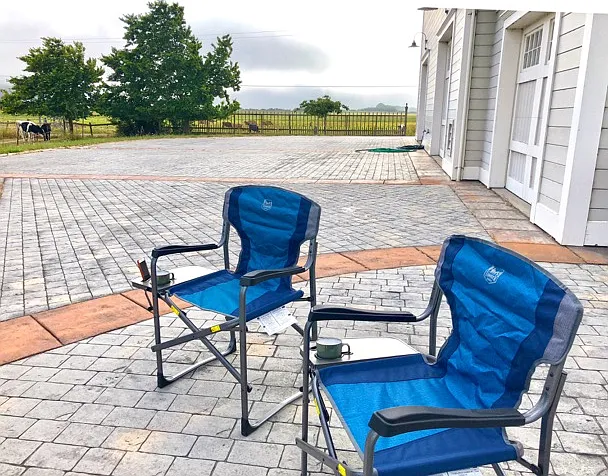 Take our folding chairs out anywhere on the cobblestone paving to maximize your view and shelter you from the wind.