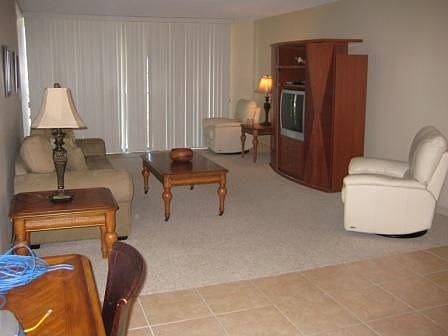 Spacioius living room with large glass doors to Lanai