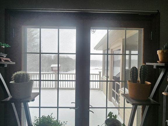 Main bedroom leads to back deck & beautiful view