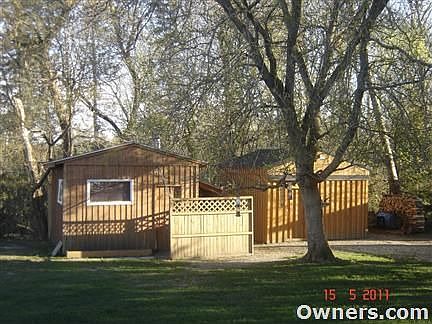 Sauna and shed in backyard