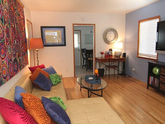 Living Room when decorated for short-term rental. All walls will be white.