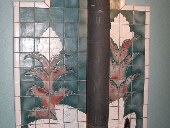 custom tile behind wood burning stove