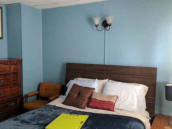 Queen bed, dresser, room darkening curtains, lap-tray, close