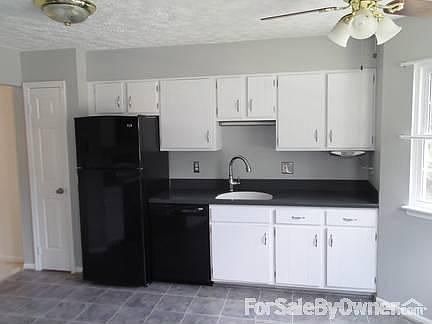 Updated kitchen
						:
						Brand new fridge, newer d/w. Corian countertops.