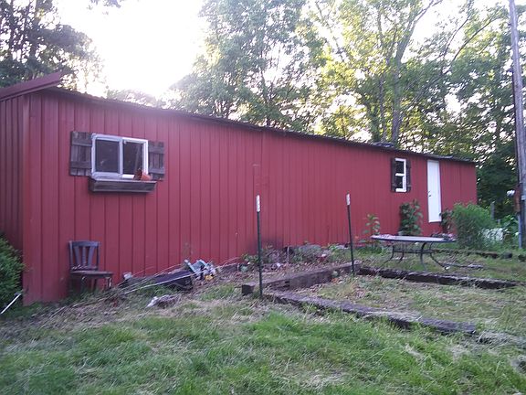 Back of home & smoke shack