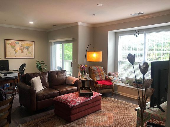 Large living room with an adjacent den